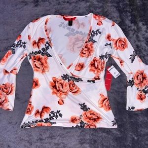 Women’s floral-printed, white “Hot Kiss” half-sleeve top!